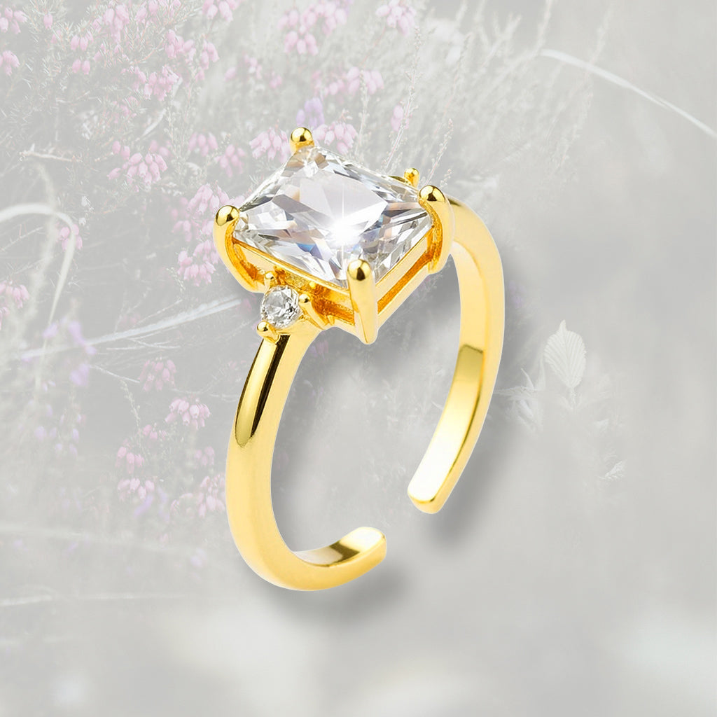 Anello solitario con centrale di Zirconia Cubica taglio smeraldo, placcato oro 18k